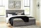 Bronyan King Panel Bed with Mirrored Dresser, Chest and Nightstand