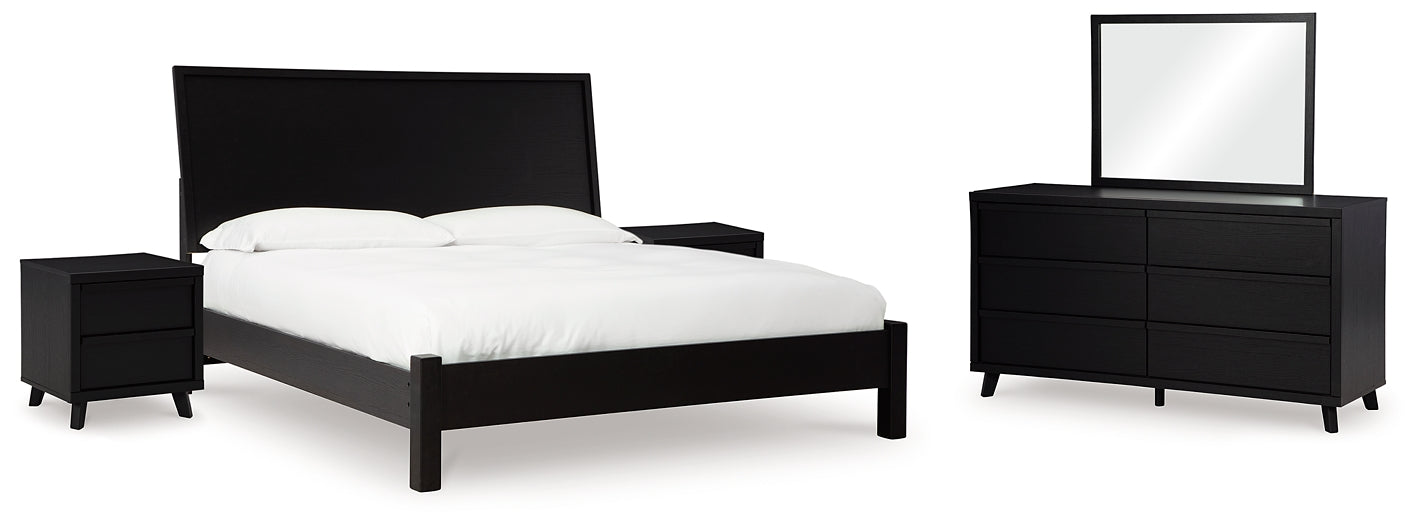 Danziar King Panel Bed with Mirrored Dresser and 2 Nightstands