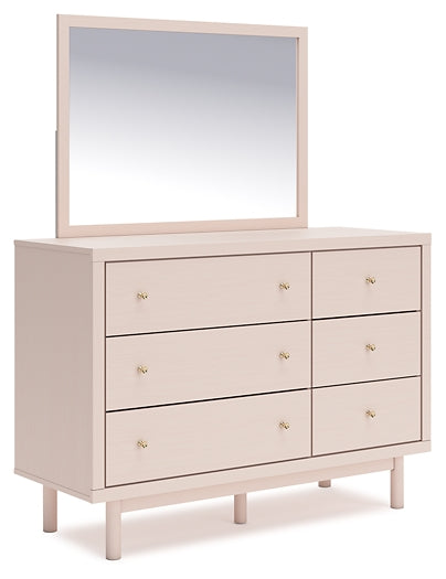 Wistenpine Full Upholstered Panel Bed with Mirrored Dresser and Chest